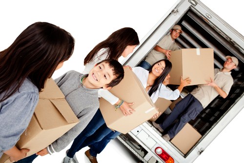 Professional packers handling household items in Wandsworth