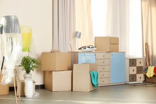 Professional movers handling furniture