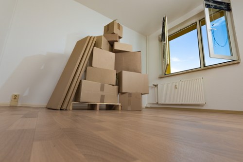 Professional office movers handling equipment